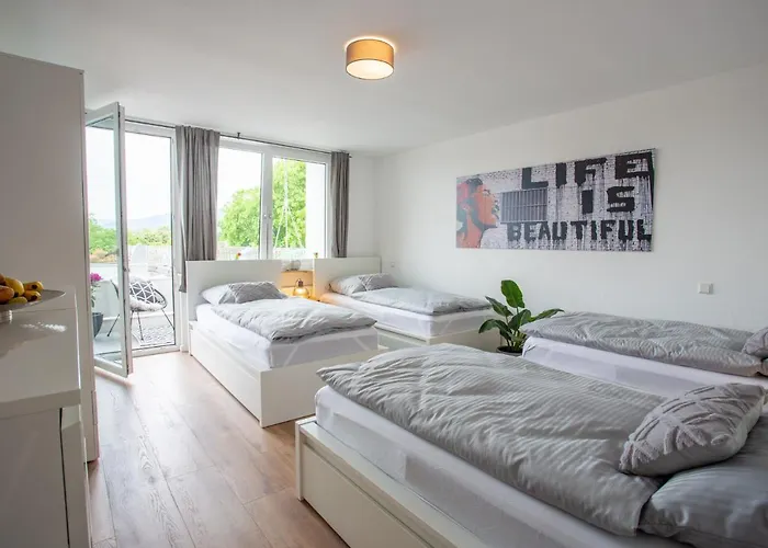 Quarto em Acomodações Particulares City-house-achern *