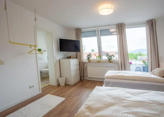 Quarto em Acomodações Particulares City-house-achern Achern